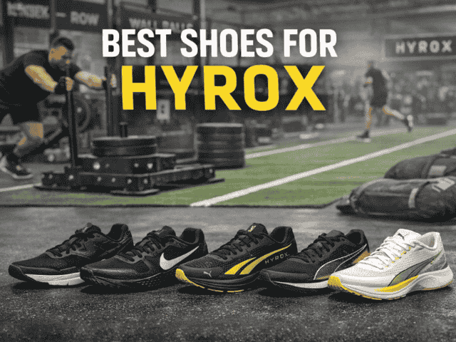 Best shoes for HYROX race day shown on gym floor with athletes performing sled push in background